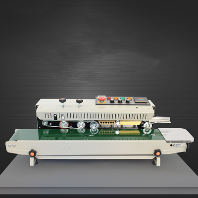 Machine de scellement automatique en bande continue pour sacs en plastique