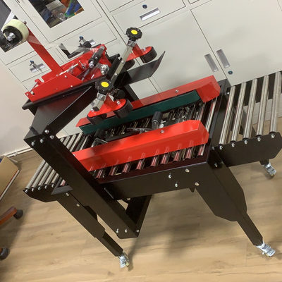 Dispositif de scellant à l'aide de ruban adhésif à boîte en carton à boîte électrique semi-automatique avec roue universelle unique