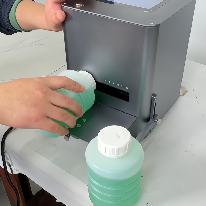 Imprimante à jet d'encre thermique de bureau pour la codage manuelle de la date d'expiration Facile à utiliser et compact